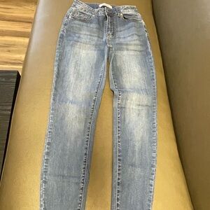 Light Blue Skinny Jeans with Distressed Details